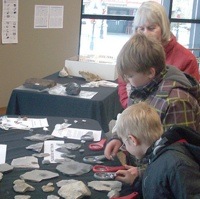 Children looking at a display at the Minerals South Conference.