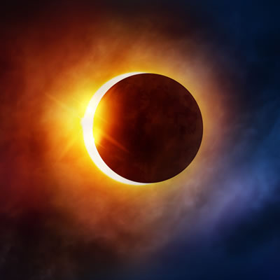 A photo of the moon covering most of the sun during a solar eclipse