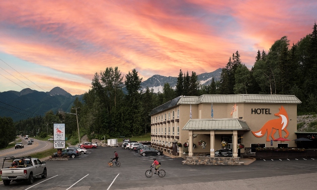 Fernie Fox Hotel with a sunset in the background