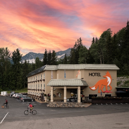 Fernie Fox Hotel with a sunset in the background