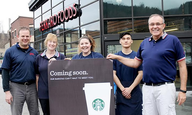 Pictured in this photo (L to R): Ferraro Foods's Jodi Bradford; Karen Parkinson; Carolyn Whitley (Starbucks manager); Matthew Newton and Danny Ferraro as they excitedly announced the new Starbucks to the local Trail Times newspaper.