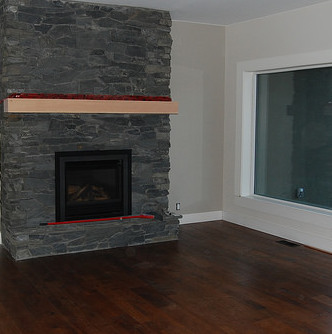 A fireplace in a basement.