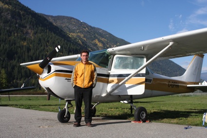 Man standing next to plane
