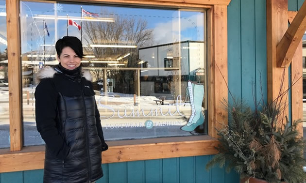 Jocelyn Brunner stands in front of her Invermere store, Summit Footwear & Fashion.