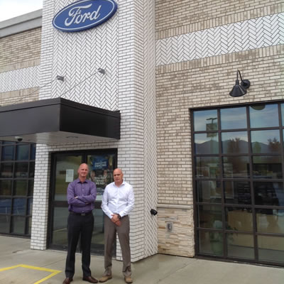 Picture of Doug Smith, manager of fixed operations at Fernie Ford and Andrew Moore, GM. 