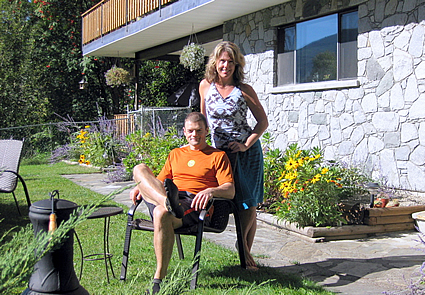 Maureen Uhrich & Henry Moscalenko sitting outside the resort
