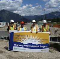 Site photo of Little Sand Creek Bridge - left to right: Andrew Madell, Site supervisor for the general contractor, Copcan Contracting; Bill Bennett, Minister of Energy and Mines; Todd Stone, Minister of Transportation and Infrastructure; Brent Shypitka, Ministry Representative.