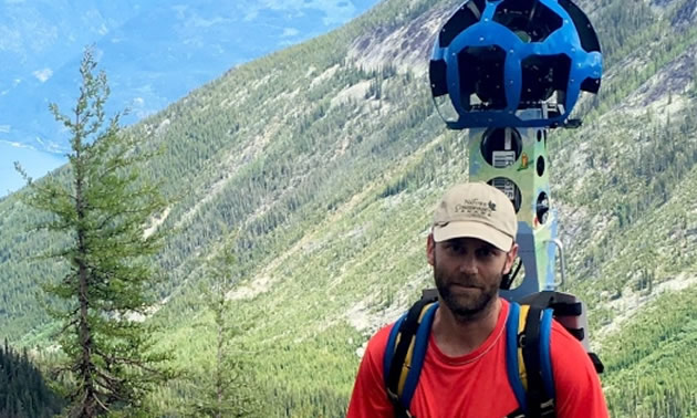 Picture of hiker with Google Trekker camera. 