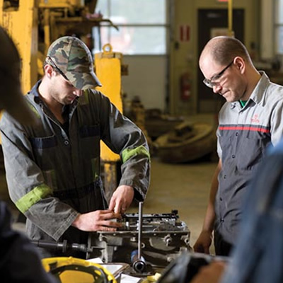 Picture of heavy-duty mechanic at work. 