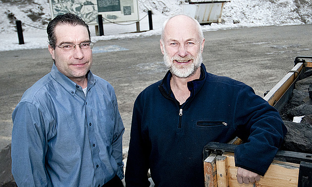 two men standing in front of a building in Sparwood BC