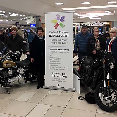 ?Cranbrook Kimberley Hospice Society board members and volunteers with the two prize bikes featured in the 2017 Harley Davidson Fundraising Raffle.