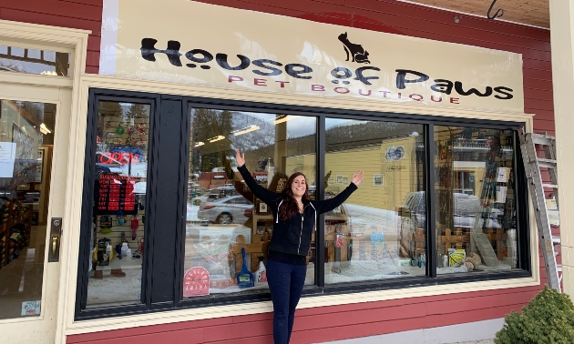 House of Paws owner in front of the store