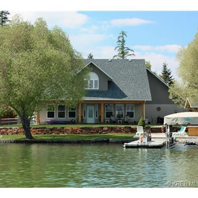 Picture of waterfront house with dock. 