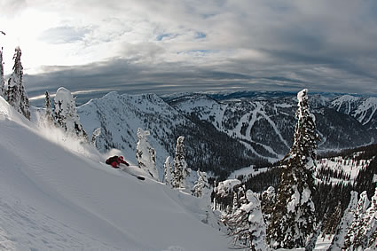 person skiing down a hill