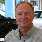 man with a GM dealership