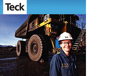 Photo of a person beside a coal truck