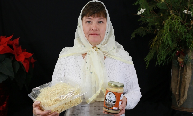 Kelly Malakoff holding food items