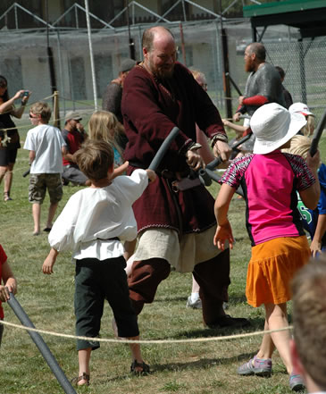 Picture of children fighting Vikings.