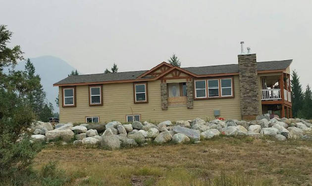 A home built by Kodiak Homes, set up on a property.