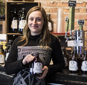 Kootenay Kombucha owner Lavinia Lidstone shows off her successful keg and growler system in Ellison's Cafe in Nelson, B.C., where customers can get her delicious health drink on tap. — Louis Bockner photo