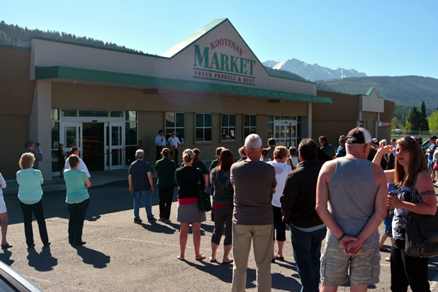 People milling around at the grand opening. 