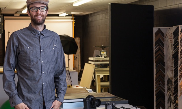 Kyle Hamilton standing in his studio in Fernie.