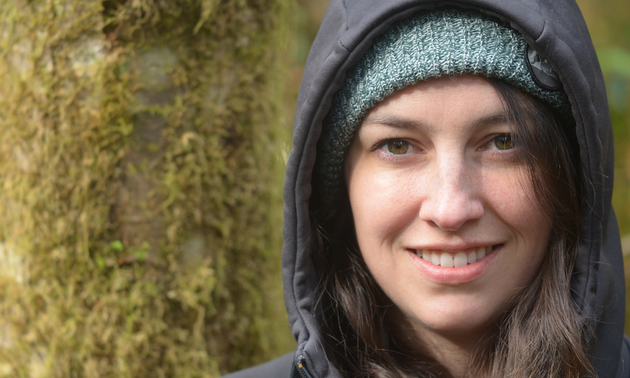 Leticia Nugent wearing a hoodie and smiling into the camera