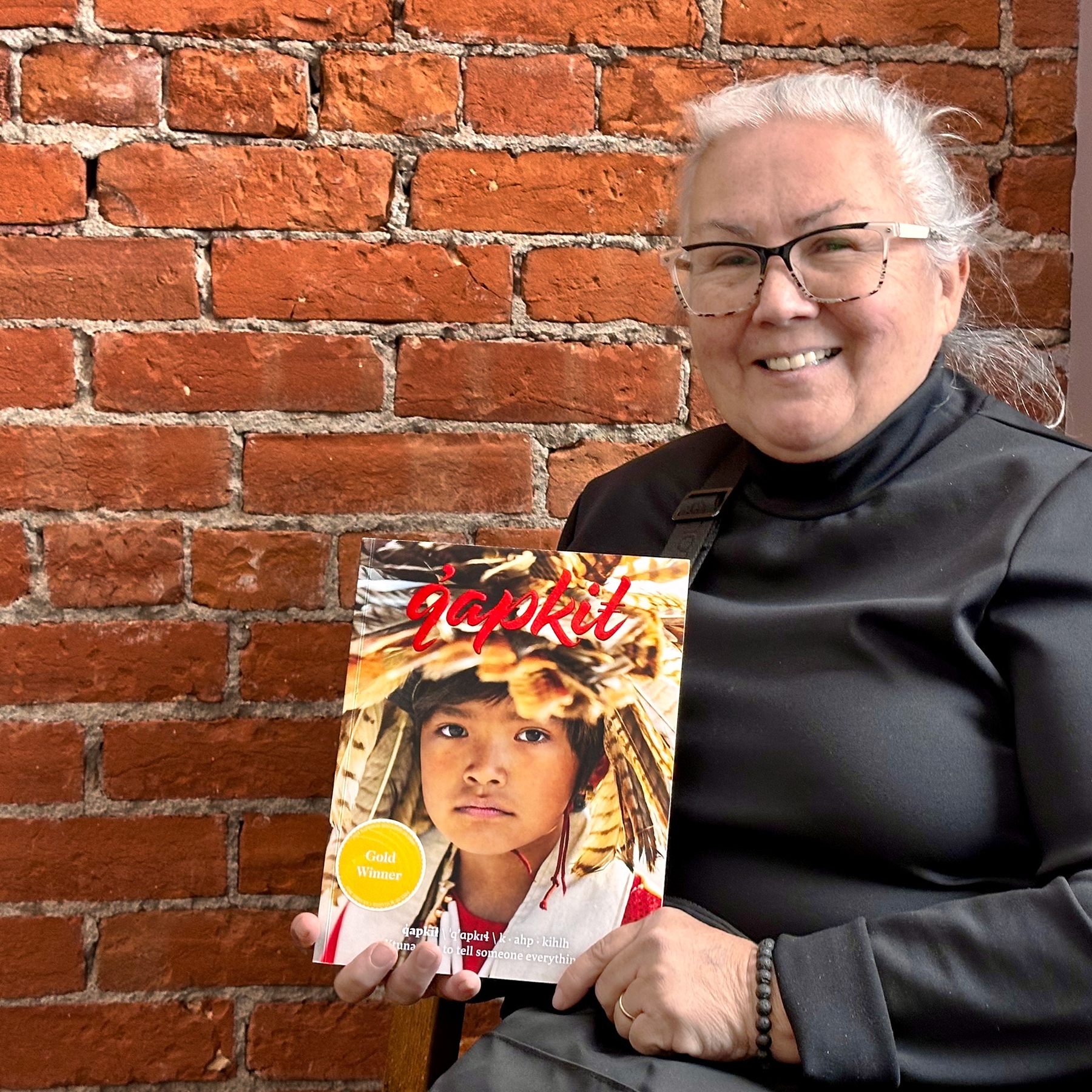 Lillian Rose with a copy of her book