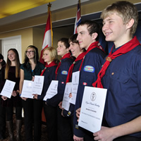 Nine youth holding their Duke of Edinburgh Award