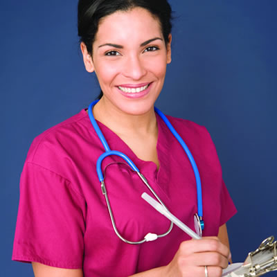Picture of nurse in pink scrubs. 