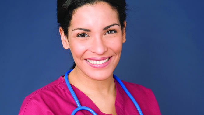 Picture of nurse in pink scrubs. 
