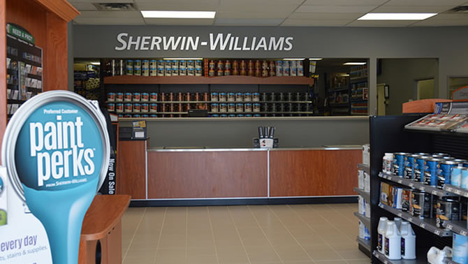 Picture of the newly redone Sherwin-Williams store showing the front desk. 