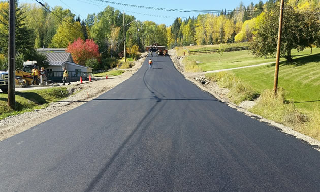 Photo of newly paved road in photo. 