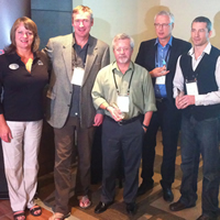Wendy Van Puymbroeck, of Kootenay Rockies Tourism, Jim Barr of Seeker Media, Kevin Weaver of the City of Cranbrook, Pacific Coastal's Kevin Boothroyd, and Tristan Chernove of the Canadian Rockies International Airport