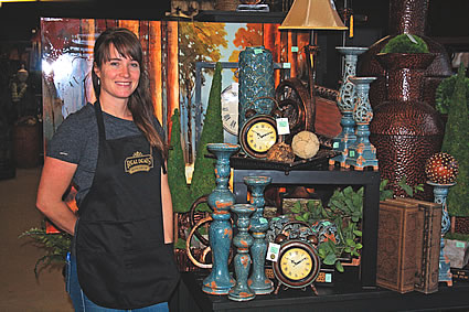 lady standing next to home decor items in Cranbrook BC