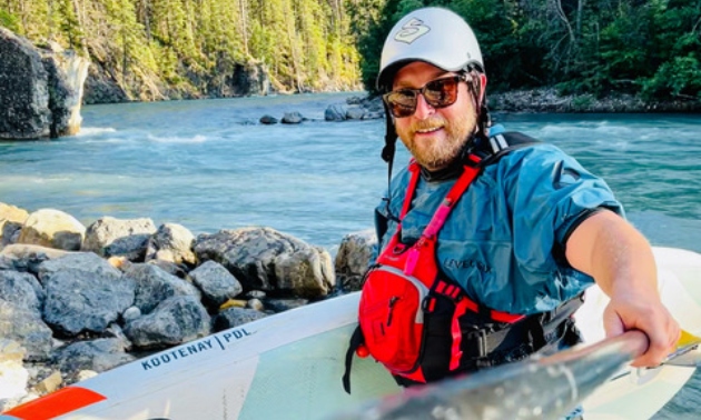 Gord on the river kayaking