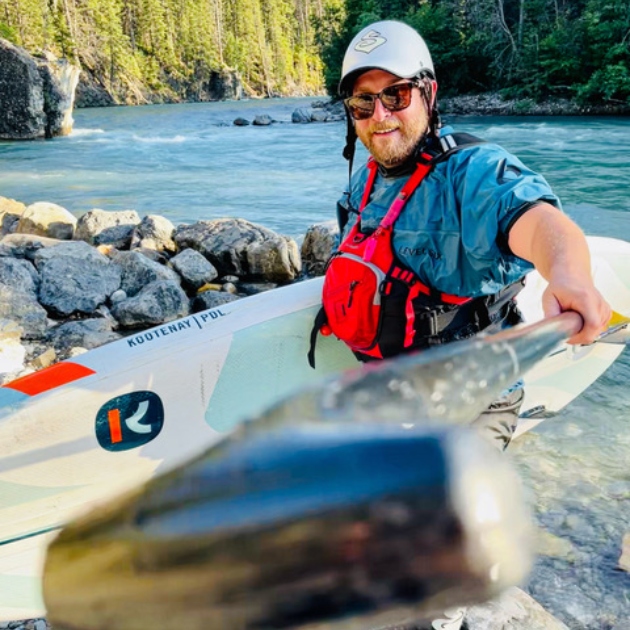 Gord on the river kayaking