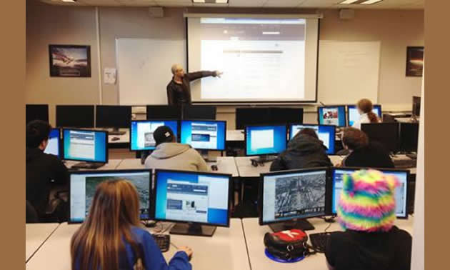 Selkirk student Ezra Buller walked high school students through some of the GIS options.
