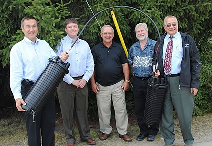 Photo of a group of people with an Fibre Optic Slice Closure