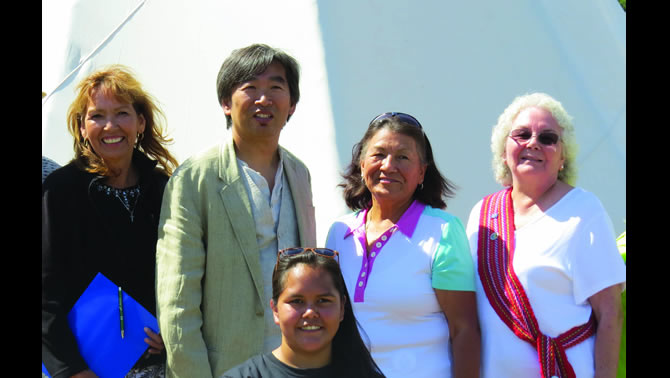 (l-r) Shuswap Band Chief Barb Cote, College of the Rockies Vice-President, Academic and Applied Research Stan Chung, Ktunaxa Nation Council Chair Kathryn Teneese, Métis Nation British Columbia’s Regional Director for the Kootenays, Marilynn Taylor and Morganna Eugene from the Ktunaxa Nation (front) celebrate the signing of the Indigenous Education Protocol.