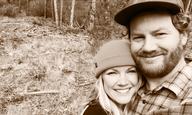 A young couple in the outdoors. 