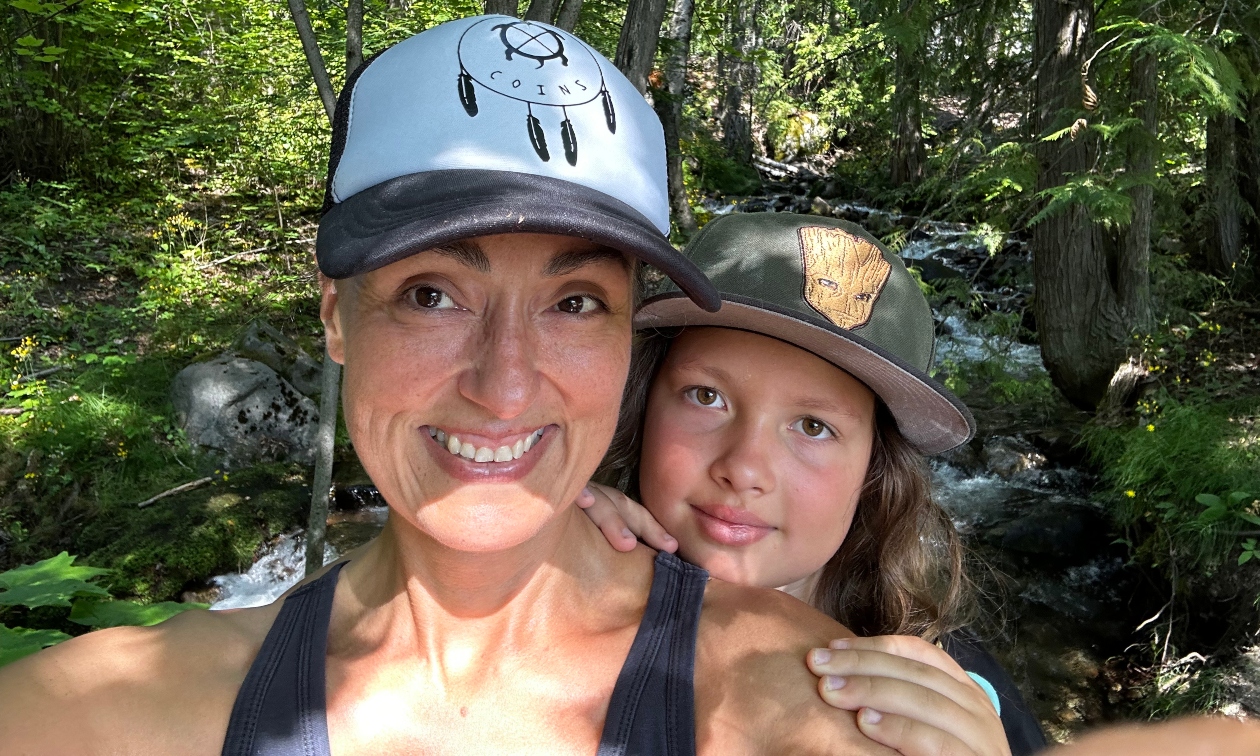 Skye-lea with her child in the forest