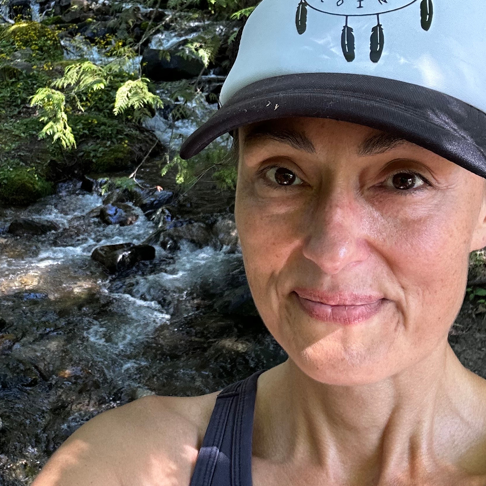 Skye-lea with her child in the forest