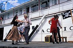 People dancing on the boat's deck