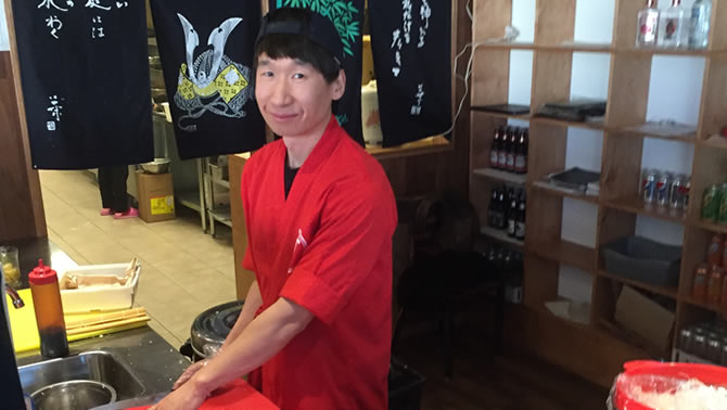 Picture of sushi chef preparing food at the Sushi Rang restaurant in Cranbrook. 