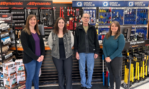Staff at Trail Hammer and Bolt standing together at the front of the store