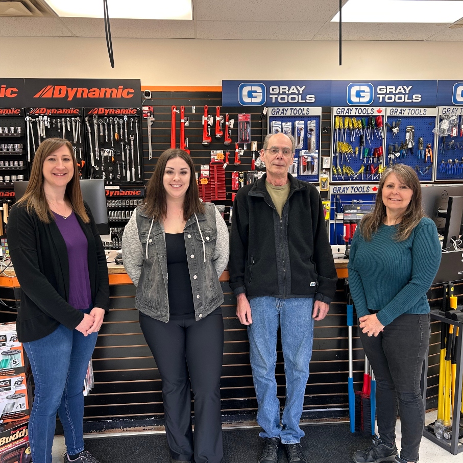 Staff at Trail Hammer and Bolt standing together at the front of the store