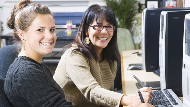 Two business women at a meeting