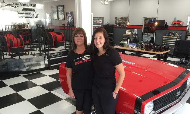 Picture of Bonnie McCormack and her daughter Kayley, at her new hair salon, The Upper Cut for Men. 