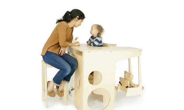 Keiko Lee-Hem sits at the UpUp Play Tower with her son, Eli. 